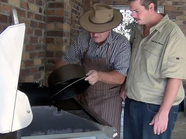 seasoning a camp oven in a hood BBQ