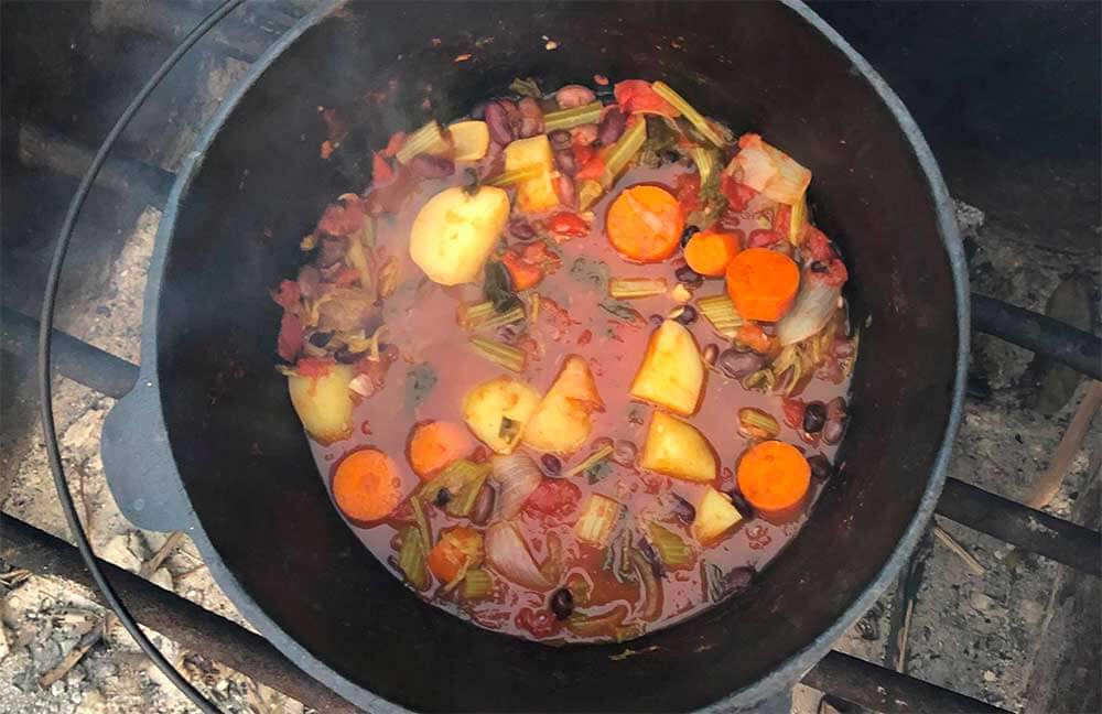 a pot od camp oven vegetable stew